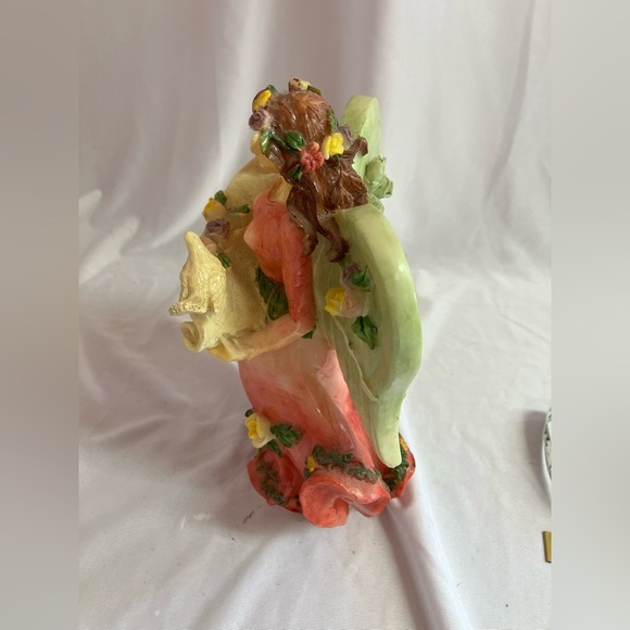 Vibrant Angel Figurine with Floral Accents - Picture 3 of 8